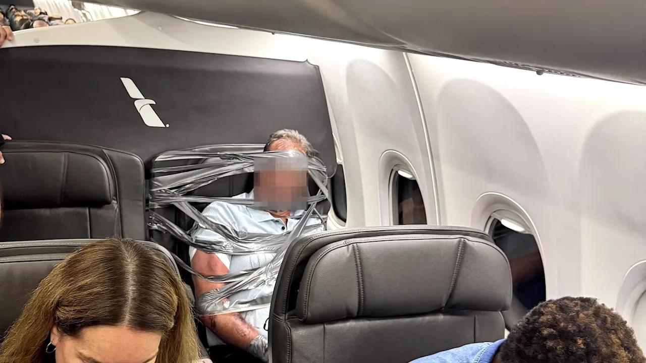 Un pasager American Airlines a fost imobilizat și lipit cu bandă adezivă de scaun după o altercație la bord